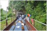 Wegen des Regens noch sprlich besetzte  Aussichtswagen  im Extrazug des Rotary Club Bihać durchs Unatal nach Martin Brod.