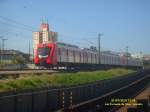 TUE srie 7000, n 7013, servindo ao Expresso Leste da CPTM (Companhia Paulista de Trens Metropolitanos) na linha 11 - Coral descendo uma rampa prxima a estao Patriarca em So Paulo.