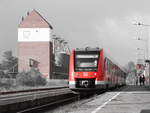 Die RWZ Agraranlage dominiert das Bahnhofsbild von Mechernich, wo gerade 620 018 als RE 22 (Köln Messe/Deutz - Gerolstein)/ RB 22 (Gerolstein - Trier Hbf) einfährt.