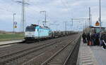 Captrain 185 549-3  Mannesmann  mit einem Stahlzug Richtung Magdeburg, am 16.02.2024 in Rodleben.