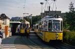 So war der Feuerbacher Bahnhof früher...Ein Sonderzug mit TW 802 (Serie T2) und ein Zug aus zwei GT4 warten noch auf Fahrgäste (1986).