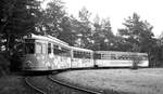 Nürnberg-Fürther Straßenbahn__AEG-Vollwerbungs-Tw 324 [GT6; MAN 1963] mit Bw in der Endschleife 'Worzeldorfer Str.' am Südfriedhof.__21-07-1976