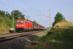 DB 185 253-2 erreicht Oberdachstetten mit einem gemischten Güterzug in Richtung Würzburg.
