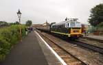 D7017 waits at Williton with a train to Minehead.