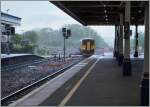 So abwechslungsreich das Wetter so die Züge: um 9.54 erreicht der First Great Western Dieseltriebzug 150 238 von Exmounth nach Paignton den Bahnhof Exeter St Davids.
