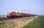 Railion 6520 und 6421 mit Opel Logistikzug 47108 (Bochum Langendreer - Antwerpen DS Oorderen) unterwegs bei Herpen am 23.04.2003.