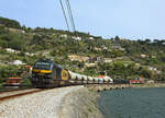 335 036 passes Baiao whilst hauling freight train 50234 from Godim to Vila Nova de Gaia, 27 March 2022