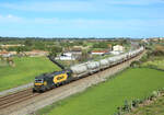 4725 pass Salreu whilst hauling a southbound cement train, 21 March 2022