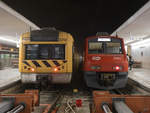 Zwei Urbano-Züge, links Baureihe 2240 und rechts die Baureihe 2300 im Lissabonner Bahnhof Santo Apolonia.