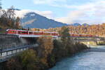 ABe 4/16 ·RhB· an der Brücke über den Rhein in Richtung Reichenau-Tamins  im Gegenverkehr mit einer unbekannten Ge 4/4 II am 20.