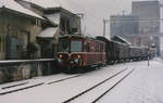 Regionalverkehr Bern Solothurn RBS  Güterzug mit De 4/4 103 bei der Einfahrt Lohn-Lüterkofen im Dezember 1996.