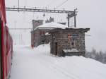 Bernina Bahn, Zug bei der Station Alp Grm (2091m)am 10.04.03 
Auch hier noch tiefer Winter.