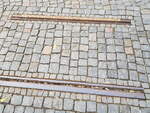 Liberec/Reichenberg__'Hier fuhr von 1897 bis 1984 die Straßenbahn' verkündet das  sprechende Gleis  in der einen Zufahrtstraße zum Rathausplatz.__04-03-2024
