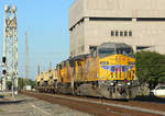6778 & 4984 depart the Port of Beaumont with a train of military vehicles.
